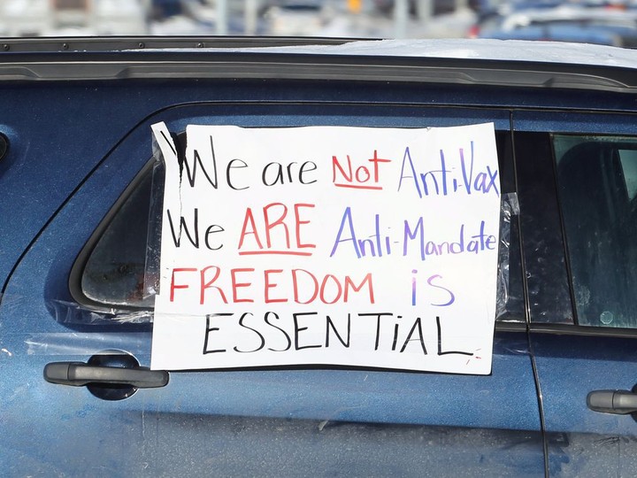  A sign on a van as a portion of the Freedom Convoy stopped outside the Manitoba Legislative Building in Winnipeg on Mon., Jan. 24, 2022