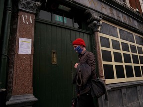 FILE PHOTO: A shuttered pub is seen with hoarding over its windows, closed due to government coronavirus restrictions amid the coronavirus disease (COVID-19) outbreak in Dublin, Ireland, September 3, 2020.