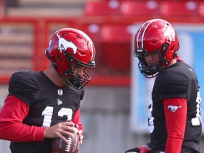 Calgary Stampeders quarterbacks Jake Maier and Bo Levi Mitchell participate in practice at McMahon Stadium in this photo from Sept. 28.