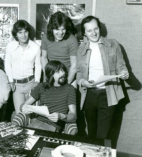 A 1973 photo of Mel Shaw, right, with Stampeders Kim Berly and Ronnie King (standing) being interviewed by DJ Dave Mickey (seated).  Photo courtesy, Stampeders
