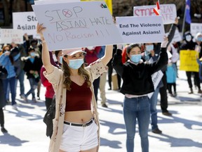 Hundreds came out to support the Stop Asian Hate rally at the Olympic Plaza hosted by the Calgary Asian Community in Calgary on Sunday, March 28, 2021.