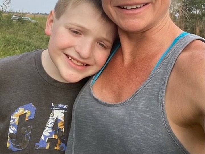  Crystal Evans and her 13-year-old son Gavin, who was diagnosed with autism spectrum disorder when he was young. Crystal Evans/Photo