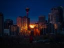 Sunrise reflects off the downtown Calgary skyline on Thursday, Oct. 28, 2021. 