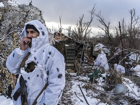 Ukrainian soldiers with the 56th Brigade in a trench on the front line on Jan. 18, 2022 in Pisky, Ukraine.
