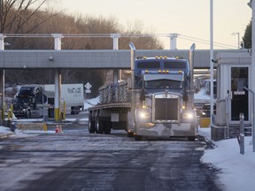 Trucks head into Canada from the U.S. at the Highgate Springs-St.Armand/Philipsburg Border Crossing in Saint-Armand, Quebec.