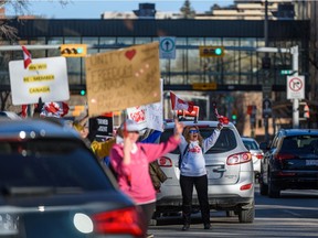 Protesters shut down the two left lanes at Macleod Trail in front of the City Hall to rally against the COVID restrictions and support the Truckers convoy on Monday, February 7, 2022. Azin Ghaffari/Postmedia