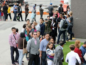 With long-term unemployment on the rise, we need a new approach to put Albertans back to meaningful work, says writer Adam Legge, president of the Business Council of Alberta.
Hundreds of people line up outside a Calgary hotel on Aug. 17, 2016, during the Calgary Airport Authorities job fair.
