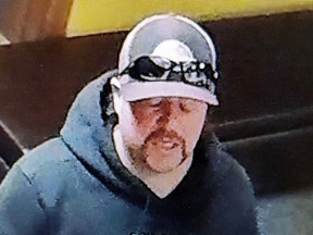 Cochrane RCMP are searching for this suspect who allegedly punched a restaurant worker in the face after asking the suspect to put on a face mask.
