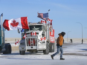 An agreement between truckers and RCMP saw one lane of traffic opened each way at the Coutts border crossing on Wednesday, Feb. 2, 2022.