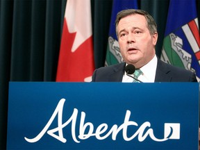 Premier Jason Kenney provides an update on COVID-19 restrictions from the McDougall Centre in Calgary. Tuesday, February 8, 2022.