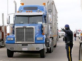 The roadblock on Highway 4 outside of Milk River heading towards the Coutts border crossing as protesters continue to slow down traffic but still keep a lane open in both directions on Tuesday, February 8, 2022.