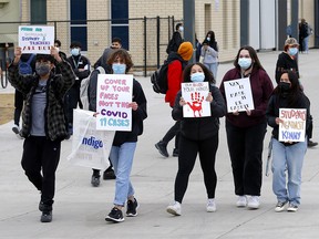 A group of students organized a walkout at Nelson Mandela High School due to the end of mask mandates in Calgary on Monday, February 14, 2022.