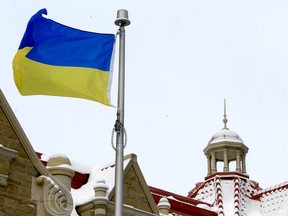 The flag of Ukraine at City Hall. Thursday, February 24, 2022.