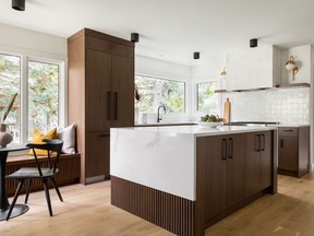 Serious style is all in the subtle details, like the wood finish below the waterfall counter.
