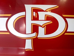Calgary Fire Department logo on the side of a service vehicle.