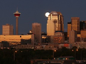 Nighttime shot of Calgary by Gordon Pennell, who met Calgary Herald photographer Ted Rhodes seeking the same photo on the same hill in 2009.