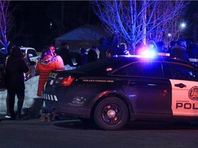 Police are on the scene following a police involved shooting along 17th Ave. SE that left one man dead. Bystanders who witnessed the afternoon shooting protested against police actions near the scene along 44th St. SE. Saturday, February 19, 2022. Brendan Miller/Postmedia