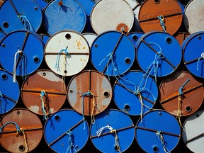 Oil barrels are pictured on October 13, 2017 at the site of Canadian group Vermilion Energy in Parentis-en-Born, France.