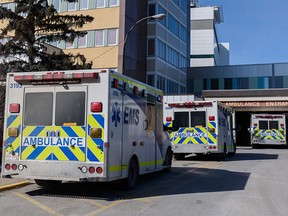 Ambulances outside the emergency entrance at Foothills hospital on Thursday, March 10, 2022.