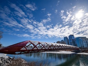 Calgarians spend the sunny morning on Peace Bridge as the landmark bridge. Photographed on Tuesday, March 22, 2022.