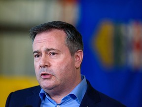 Prime Minister Jason Kenney speaks at a news conference on March 25, 2022.
