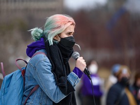 University of Calgary School of Performing Arts student representative Sofia Huarte Aguilar speaks as students gather outside the MacEwan Student Center on campus to protest budget cuts and fee increases tuition on Monday, March 28, 2022.