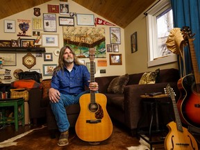 Folk and country singer Bryson Waind at his home in Calgary. He is releasing his new album Channel Breaker in April 2022. Steven Wilhelm/Postmedia