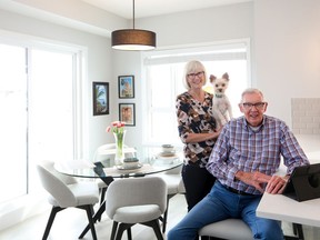 Arlene and Bruce Dahlager, and their family dog Jakey, 1, love the light and roominess in their new home in Seton Summit by Cedarglen Living.