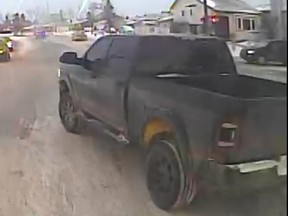 Calgary police released images of a truck sought in a road rage incident that saw a driver shot in the arm. The vehicle is described as a dark grey 2014 or 2015 Dodge Ram 1500 with a lift kit and aftermarket taillights.
