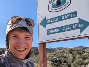 Jeromy Farkas stands at the base of the Pacific Crest Trail on March 12, 2022.