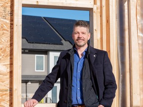 Avalon Master Builder  president Ryan Scott at the launch of Zen Sequel, where solar panels provide as much energy as the building consumes over a year.