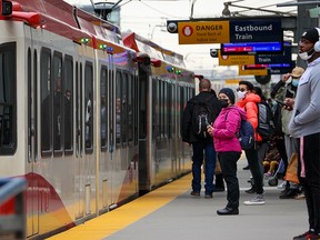 CTrain riders wait at Stadsaal Station on 23 March 2022.