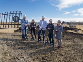 A ground-breaking ceremony was held at Hamilton Heights on March 15. The new community will offer 18 gated homes, each on 2.5-acre lots, situated around a cul-de-sac, in De Winton. From left, Clint Pilon, area sales manager Hamilton Heights; Anna Kaufman MacLean, director of sales;
Michael Brown, president, Trico Residential; Kris Van Grieken, president, Telsec; Tina Fitzgerald, planning and design director, Telsec.