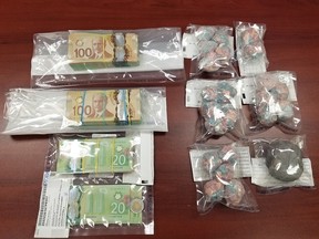 Fort Macleod RCMP seized more than 700 grams of fentanyl and $30,000 after checking on a man sleeping in an idling vehicle.