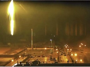 This screen grab on March 4, 2022 from footage of the Zaporizhzhia nuclear authority shows the Ukrainian nuclear plant during an attack with shell fire by Russian forces.