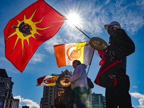 Sober Crew/American Indian Movement opens the Unite Against Racism rally with singing and drumming near Calgary's Peace Bridge on Sunday, March 20, 2022. Ten Calgary social justice organizations hosted the event to recognize the United Nations International Day for the Elimination of Racial Discrimination.

Gavin Young/Postmedia