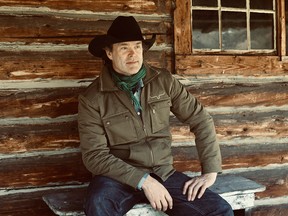 Singer Corb Lund at the cabin at the Rocking P ranch property in the Livingstone River valley right below Cabin Ridge, site of a proposed coal mine north of Coleman, Alta. The ridge was named for this cabin.