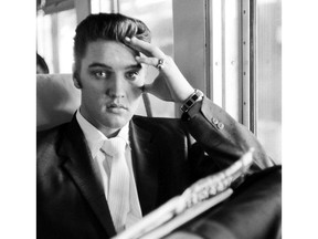 On this day in history, Iin 1956, Paramount Pictures signed Elvis Presley to a three-picture contract only five days after his first screen test. Picutred is Presley on the Southern Railroad between Chattanooga and Memphis in 1956; by Dave McKenna, special to The Washington Post; Postmedia files.