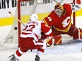 Calgary Flames goaltender Jacob Markstrom stops Detroit Red Wings forward Vladislav Namestnikov at Scotiabank Saddledome in Calgary on Saturday, March 12, 2022.