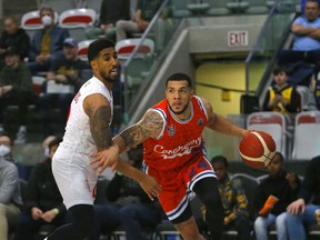 Cangrejeros' Emmanual Andujar drives past Real Esteli's Jezreel De Jesus during Basketball Champions League Americas action at WinSport in Calgary on Tuesday night.