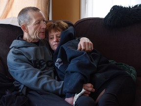 Paul Longbottom and his wife Elizabeth Adams have moved into a furnished apartment after being homeless in the streets of Calgary. The couple and their dog Gremlin used to live at the tent city outside the Calgary Drop-In Centre before the encampment was removed by authorities on Feb. 10, 2022.