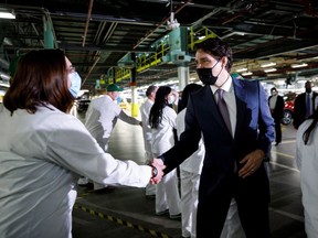 Prime Minister Justin Trudeau greets employees as he visits the production facilities of Honda Canada Manufacturing in Alliston, Ontario, Canada March 16, 2022. Trudeau is not showing the same support for Indigenous aspirations in the oil and gas industry, writes Chris Sankey.