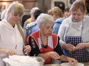 Dozens of volunteers are seen preparing thousand of hand-made perogies with proceeds going to help people in Ukraine. The perogies will be sold through the Blessed Virgin Mary Ukrainian Catholic Church.