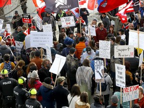 Crowds continue to gather in Beltline on Saturday's causing a disturbance to the many residents and businesses in the area. Saturday, March 12, 2022.