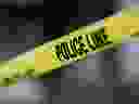 File - Calgary police tape is seen around the scene of a crime on Friday, April 8, 2022.