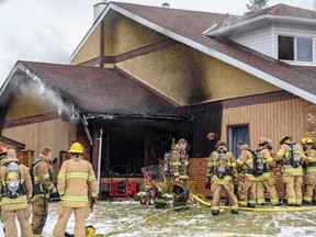FILE PHOTO: Calgary Fire Department responds to a fire at 84 Woodfield Crescent S.W. on Friday, April 15, 2022. The fire did not cause any injuries.