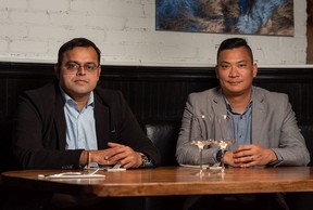 Ravi Panchagunla, Tomahawk Kitchen and Bar owner, left, and general manager Albert Leong. Azin Ghaffari/Postmedia