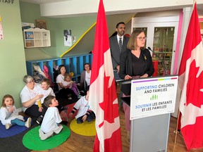 Minister of Families, Children and Social Development Karina Gould, with Calgary Skyview MP George Chahal in the background, announces grant funding for a children’s physical literacy program from a Cochrane daycare April 22.