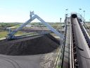FILE PHOTO: Coal moving equipment at the new Keephills 3 power station at Wabamun, west of Edmonton, Alberta on August 24, 2011.