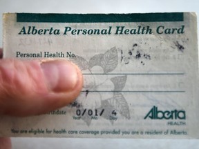 The Alberta government hoped to replace the flimsy health-care cards but the COVOD-19 pandemic has put that on hold for now, it says.